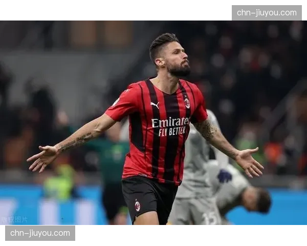 特写：圣西罗雨战，吉鲁门线解围后与麦尼昂激情相拥。